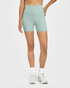 Women's High-Rise Bike Shorts with Cross-Over Waistband running — custom OEM activewear by New...