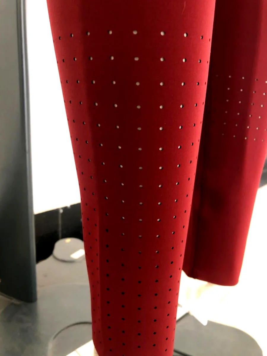 Laser-cut ventilation on performance leggings