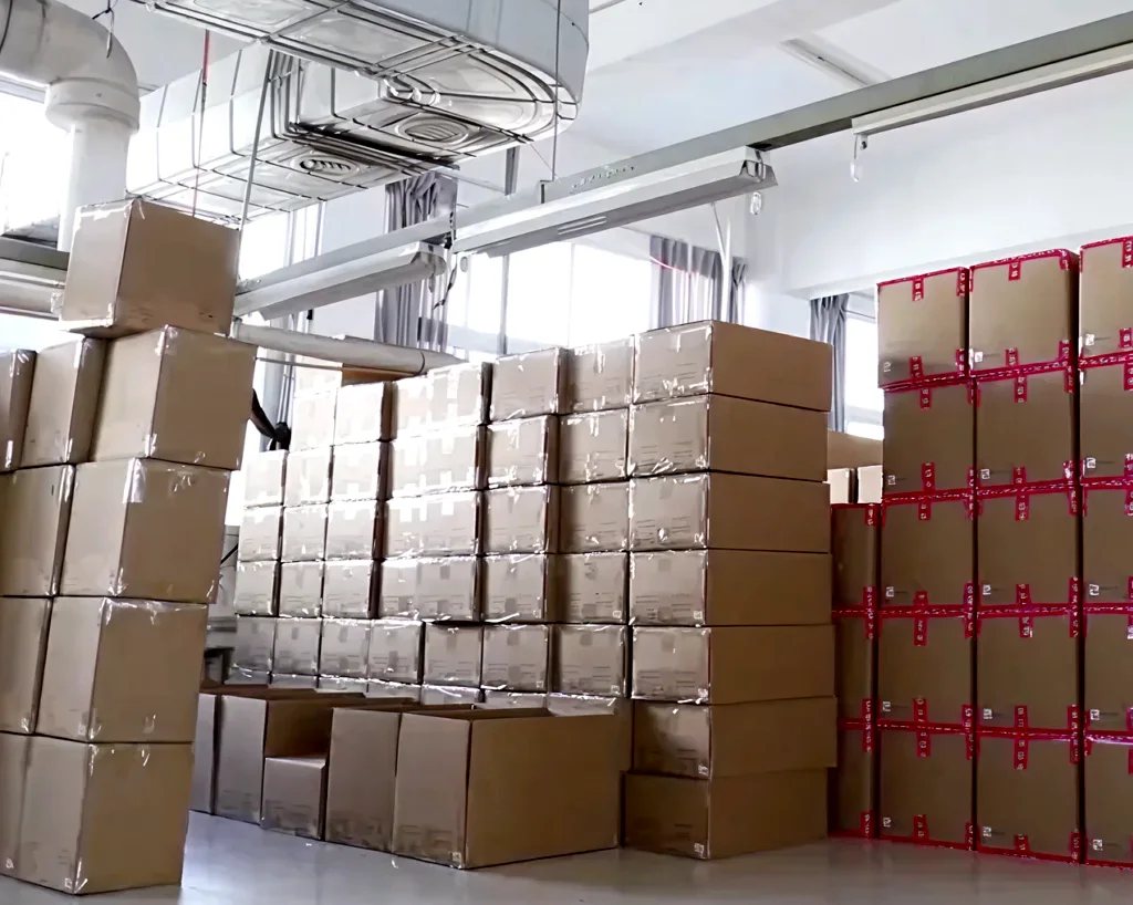Finished activewear orders packed in cartons for shipment